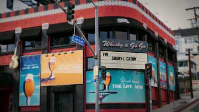 I remember driving down
Sunset and seeing her name - Sheryl