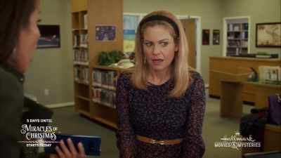 I saw Cassie standing
next to the cheeseboard - Aurora Teagarden Mysteries: Reunited and It Feels So Deadly