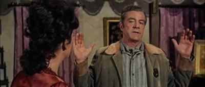 I say let's string him up
and get it over with. - Johnny Reno