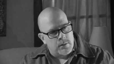 I see a man standing right
by the door, - The Holzer Files