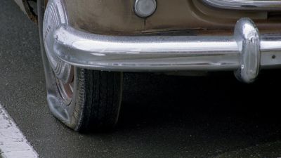 I see your front tires gone a bit flat on ya there Burt - The World's Fastest Indian