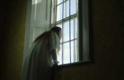 I see her on that long
road, under the trees, - The Yellow Wallpaper