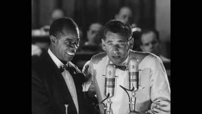 I should say that it is rather we, - Louis Armstrong's Black & Blues