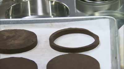  I think by stacking
 the cookies, - Halloween Cookie Challenge