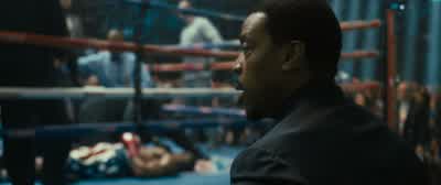 This arena is completely silent as the audience waits to see what will be the condition of young Adonis Creed. - Creed II