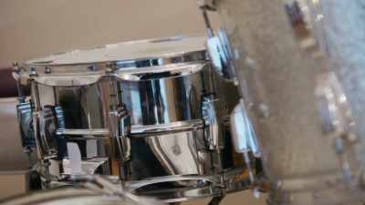 I turn left,
I see a five piece drum kit, - Renovation Impossible