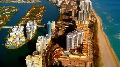 ( wild Latin theme playing) - CSI: Miami