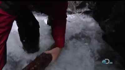 WITH GREASY ROCK UNDERFOOT, - Man vs. Wild