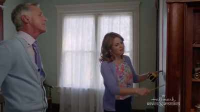 I wonder if the closet's
behind this bookshelf? - The Julius House: An Aurora Teagarden Mystery