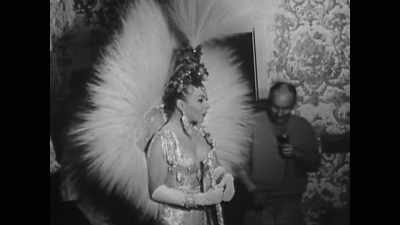 I wore headdresses that it took
two people to carry backstage - Vegas: The Story of Sin City