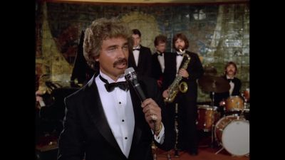 I'd like to dedicate
this song to her. - The Love Boat