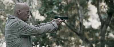 If this guy's a cop,
by golly I think he is, - Out of Death