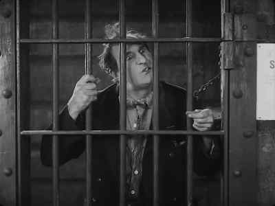 "If he'd ever hit you on
your jaw, he'd break it." - Steamboat Bill, Jr