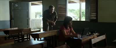 In the 90 degree heat Solomon Vandy drops to his kneesrattling the wire with his powerful handsWhat NothingDo you think I'm exploiting his griefYou're right It's shitIt's like one of those infomercialsYou know the little black babies with swollen bellies - Blood Diamond