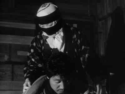 If only the radio would arrive, - Woman in the Dunes