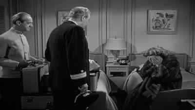 I'll call the ship's
doctor. Perhaps he can- - Dangerous Crossing