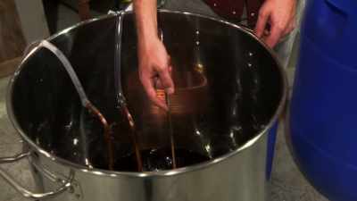 I'll warm it up, so that
it dissolves the sugar - Moonshiners: Master Distiller