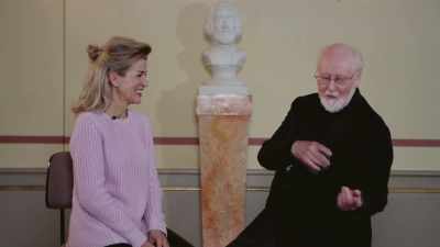 I'm conducting, you are there.
I start to smile, almost laughing! - John Williams: Live in Vienna