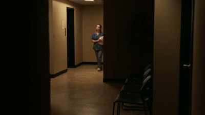 I'm going down the hallway
and I see what I think - Haunted Hospitals