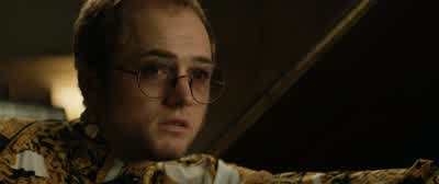 ♪ I'm growing tired ♪ ♪ And time stands still before me ♪ - Rocketman