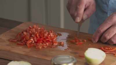 I'm now going back
to the chopping the tomatoes, - James May: Oh Cook!