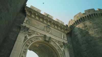 - I'm standing here
beside Porta Capuana, - Write Around the World with Richard E Grant