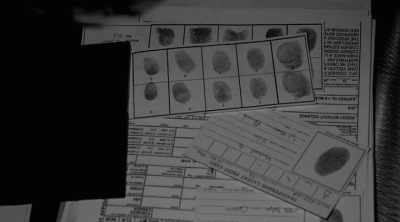 Immigration official went to visit
this man. - The Devil Next Door