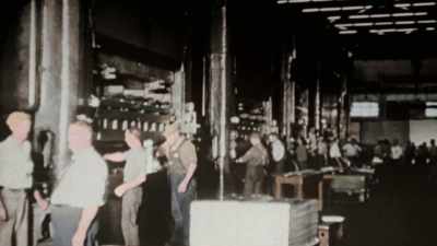 IN 1946 MILITARY SPENDING
FALLS BY HALF, - America in Color