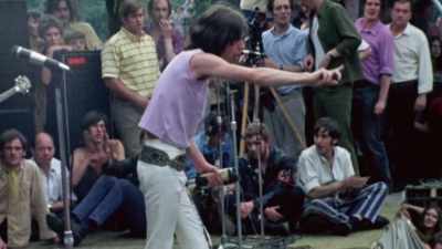 In its communal atmosphere,
it echoed the peaceful unity - Days of Rage: The Rolling Stones' Road to Altamont