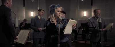 In her dream,
she sees her despondent son - American Traitor: The Trial of Axis Sally