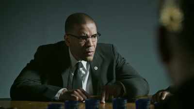 In every appearanceon radio or television, - Godfather of Harlem
