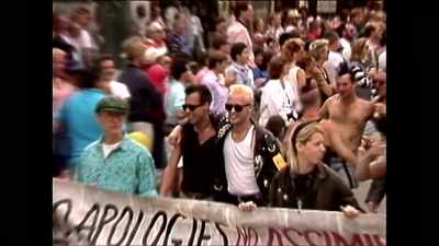 - In front of that was a banner that said - Queercore: How to Punk a Revolution