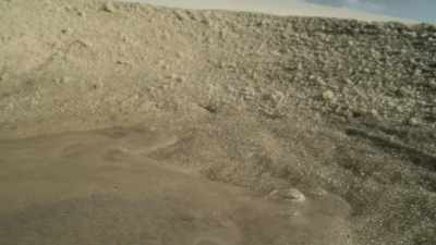 In most dunes, water quickly drains
through the sand....  - Super/Natural