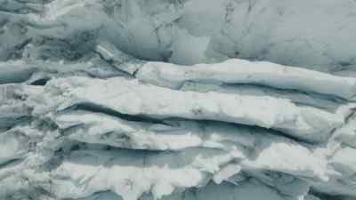 In the Antarctic,
ice clings to the highest mountains - Prehistoric Planet