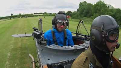 In the open cockpit,
the backwash from the propeller - Scotland from the Sky