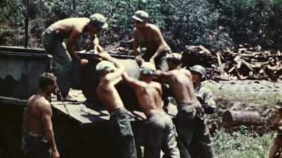 In the rush to
unload, urgent supplies - The Pacific War in Color