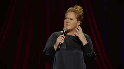 In the womb, and he comes in, - Amy Schumer: Growing