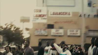 [INAUDIBLE CROWD CHATTER]. - LA 92
