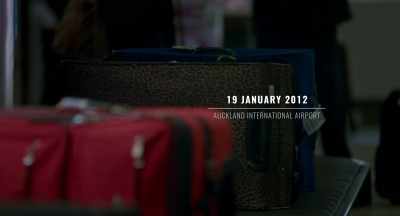 [indistinct announcements] - Kim Dotcom: Caught in the Web