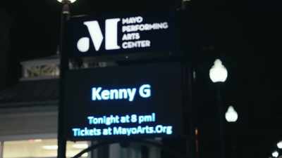 (INDISTINCT AUDIENCE CHATTER) - Listening to Kenny G