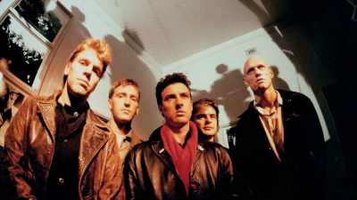 -[indistinct chatter]
-[introspective music playing] - Midnight Oil: The Hardest Line