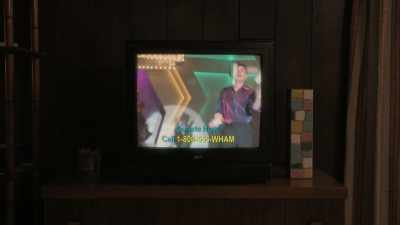 [indistinct chatter over TV] - On Becoming a God in Central Florida