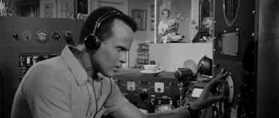 [indistinct chattering
on radio] - The World, the Flesh and the Devil