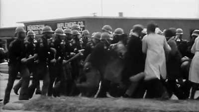 -(INDISTINCT CLAMOR)
-...and police with truncheons. - Obama: In Pursuit of a More Perfect Union