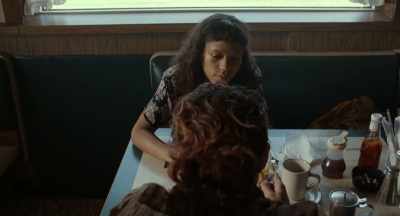 [indistinct TV chatter] - Bones and All