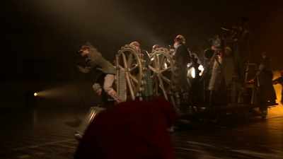(♪ INDUSTRIAL, POUNDING BEATS) - Great British Theatre