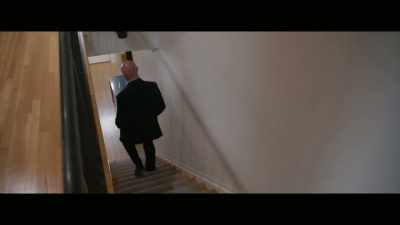Instead he heads
down the stairs, - Who Killed Robert Wone?