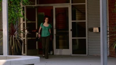 (into earwig): Okay, she's just
left the building. - NCIS: Los Angeles