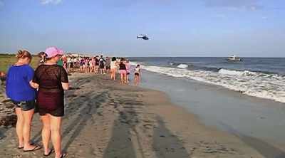 Investigators try to
understand what the shark - Shark Attack Files