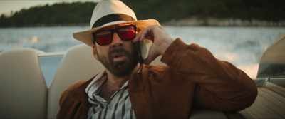 Is he a Spanish Dr. No?
Is he into something strange? - The Unbearable Weight of Massive Talent